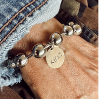 Mixed Metal Kind Charm Bracelet