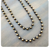 Twist Style Satin Gold Crystal Long Strand Necklace